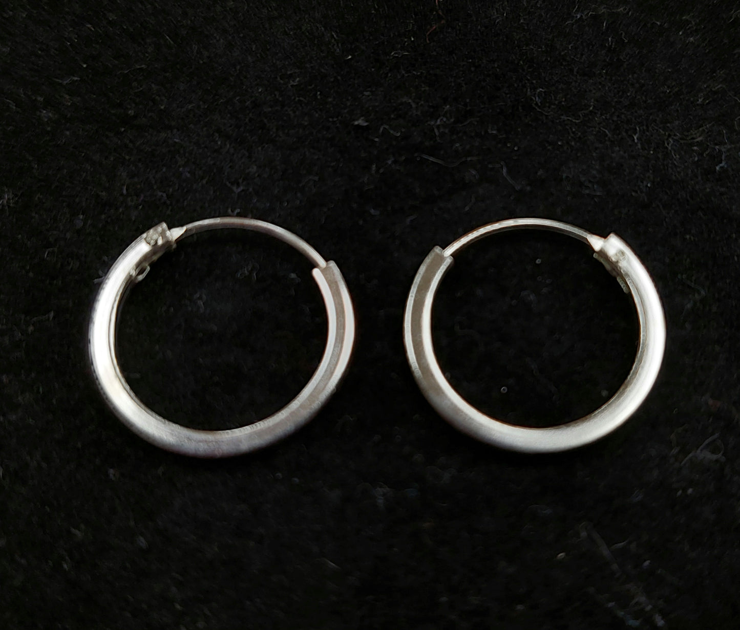 Flat Silver Hinged Hoops.
